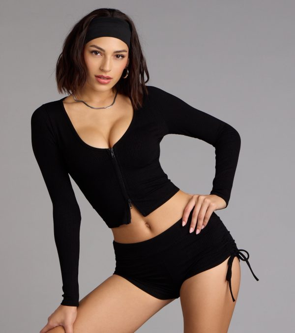 Trendy women’s tops, like the Everyday Long Sleeve Zip-Up Crop Top, bring effortless style for fall layering, lounging, or going out.