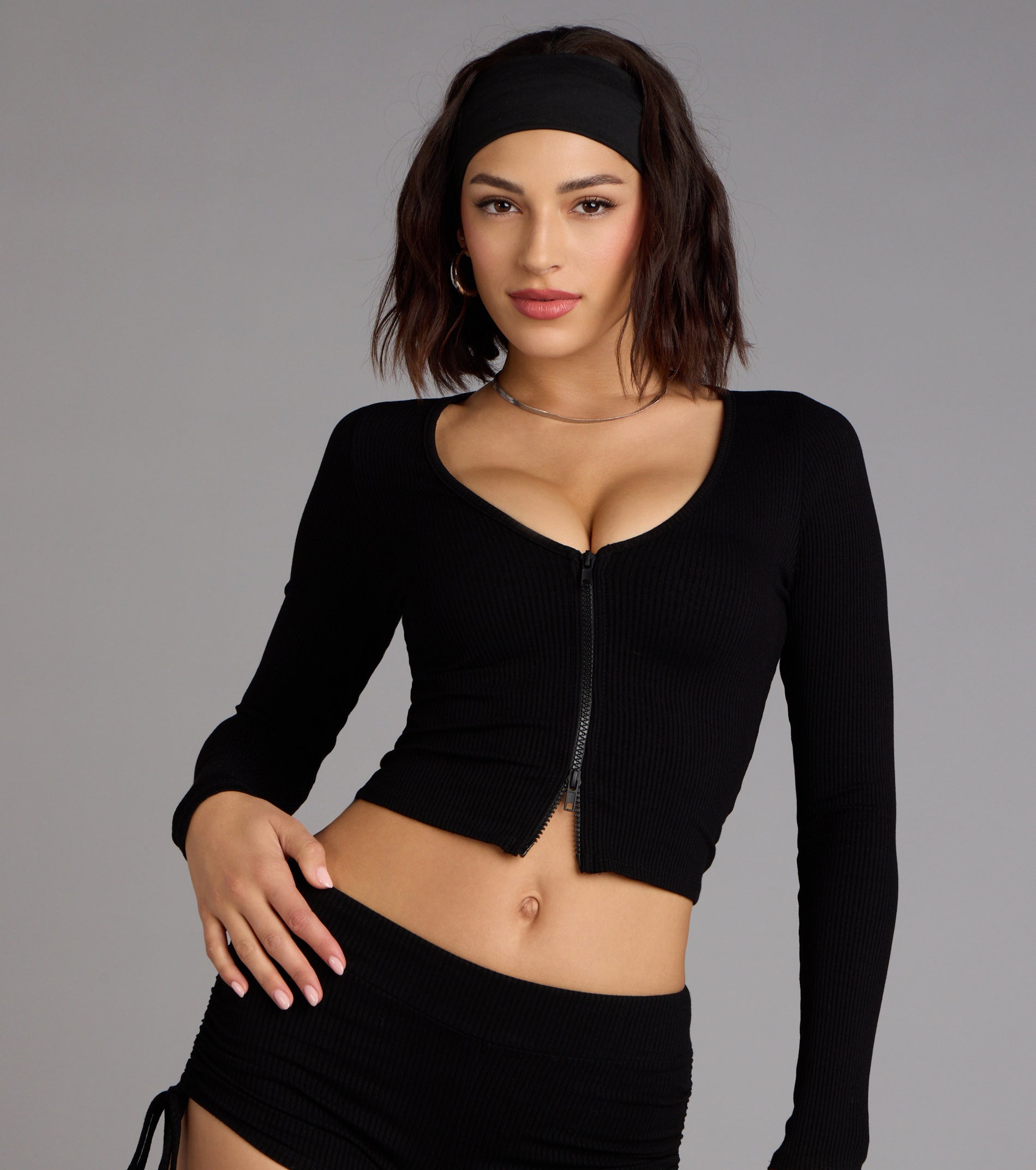 Trendy women’s tops, like the Everyday Long Sleeve Zip-Up Crop Top, bring effortless style for fall layering, lounging, or going out.