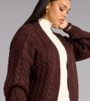 This brown piece brings trend-right energy to the Wrap Me Up Cable Knit Cardigan, perfect for fall outfits that stand out.
