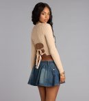 This piece brings trend-right energy to the Cozy Twist Cable Knit Tie Back Sweater, perfect for fall outfits that stand out.