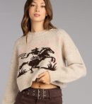 Trendy women’s tops in 0, like the Western Charm Horse Graphic Sweater, bring effortless style for fall layering, lounging, or going out.