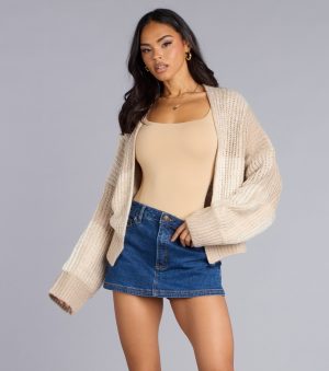This piece brings trend-right energy to the Snuggle Up Oversized Knit Crop Cardigan, perfect for fall outfits that stand out.