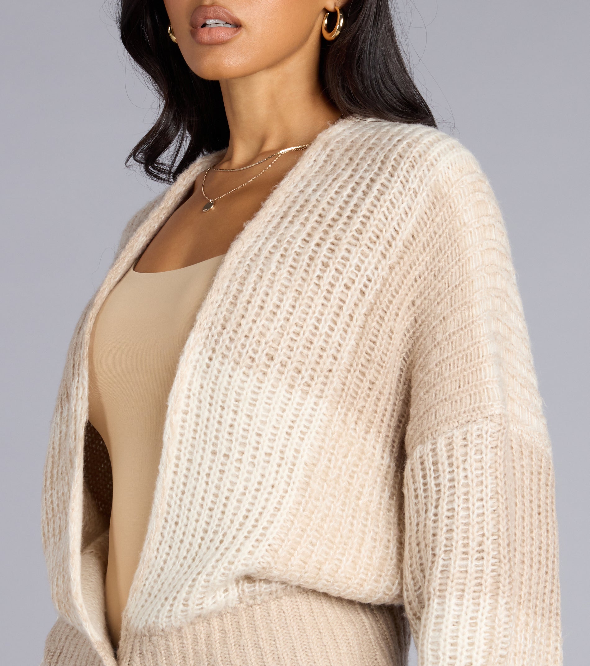 This piece brings trend-right energy to the Snuggle Up Oversized Knit Crop Cardigan, perfect for fall outfits that stand out.