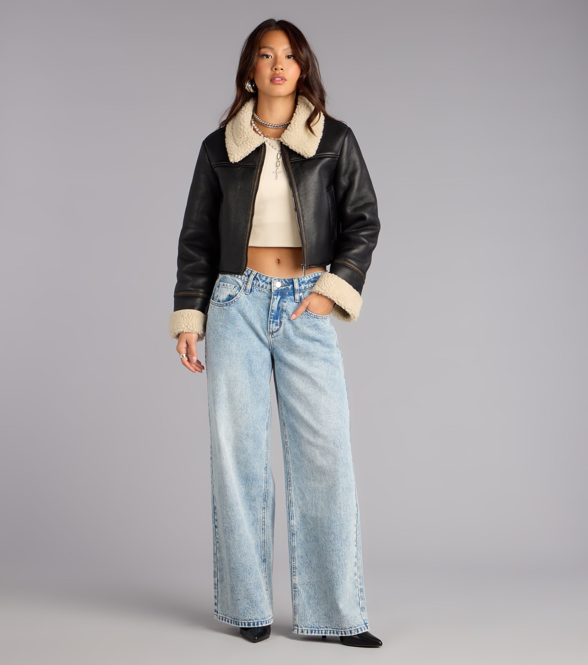 This black piece brings trend-right energy to the Downtown Girl Faux Leather Sherpa Crop Jacket, perfect for fall outfits that stand out.