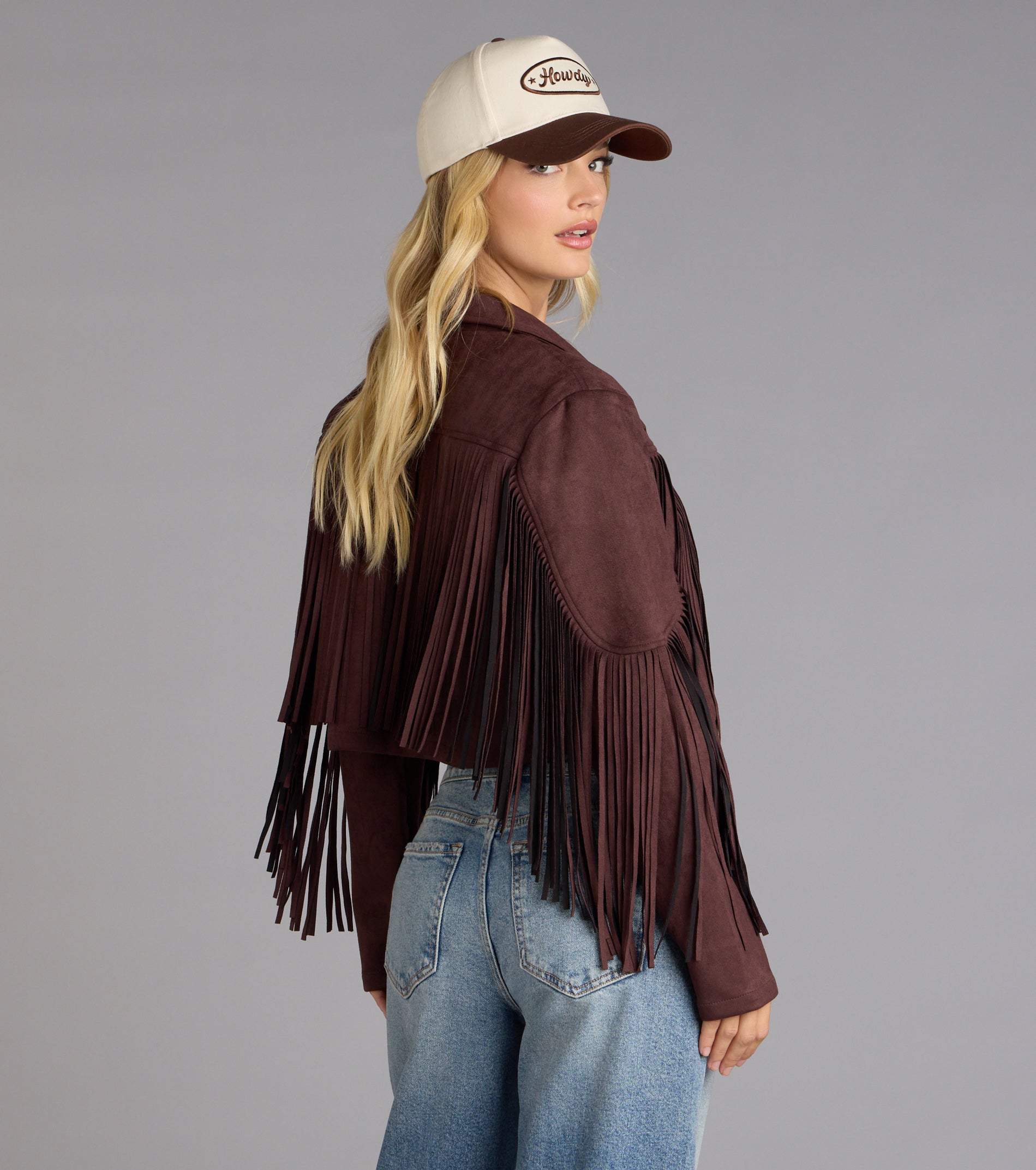 This piece brings trend-right energy to the Trailblazer Faux Suede Fringe Jacket, perfect for fall outfits that stand out.