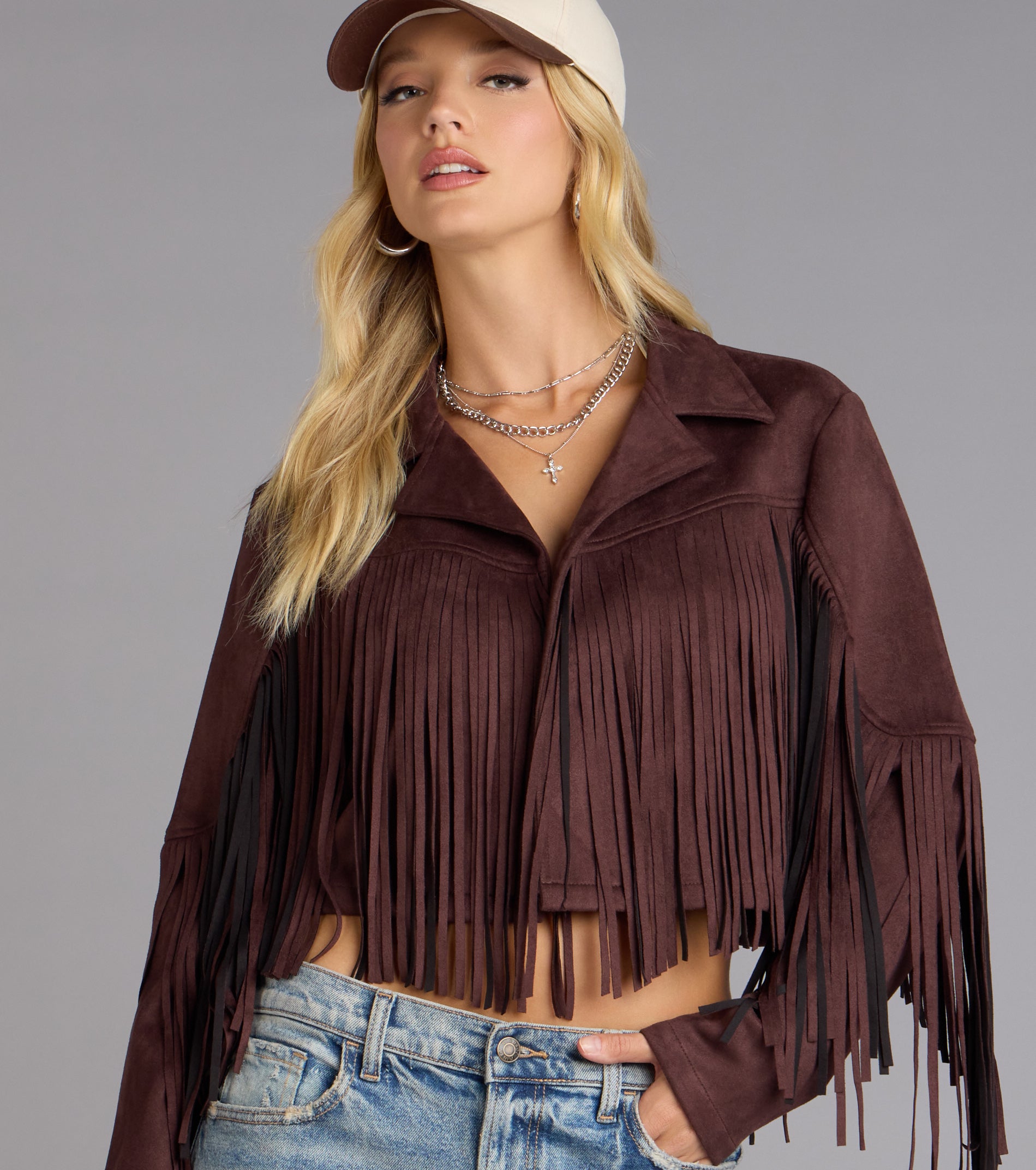 This piece brings trend-right energy to the Trailblazer Faux Suede Fringe Jacket, perfect for fall outfits that stand out.