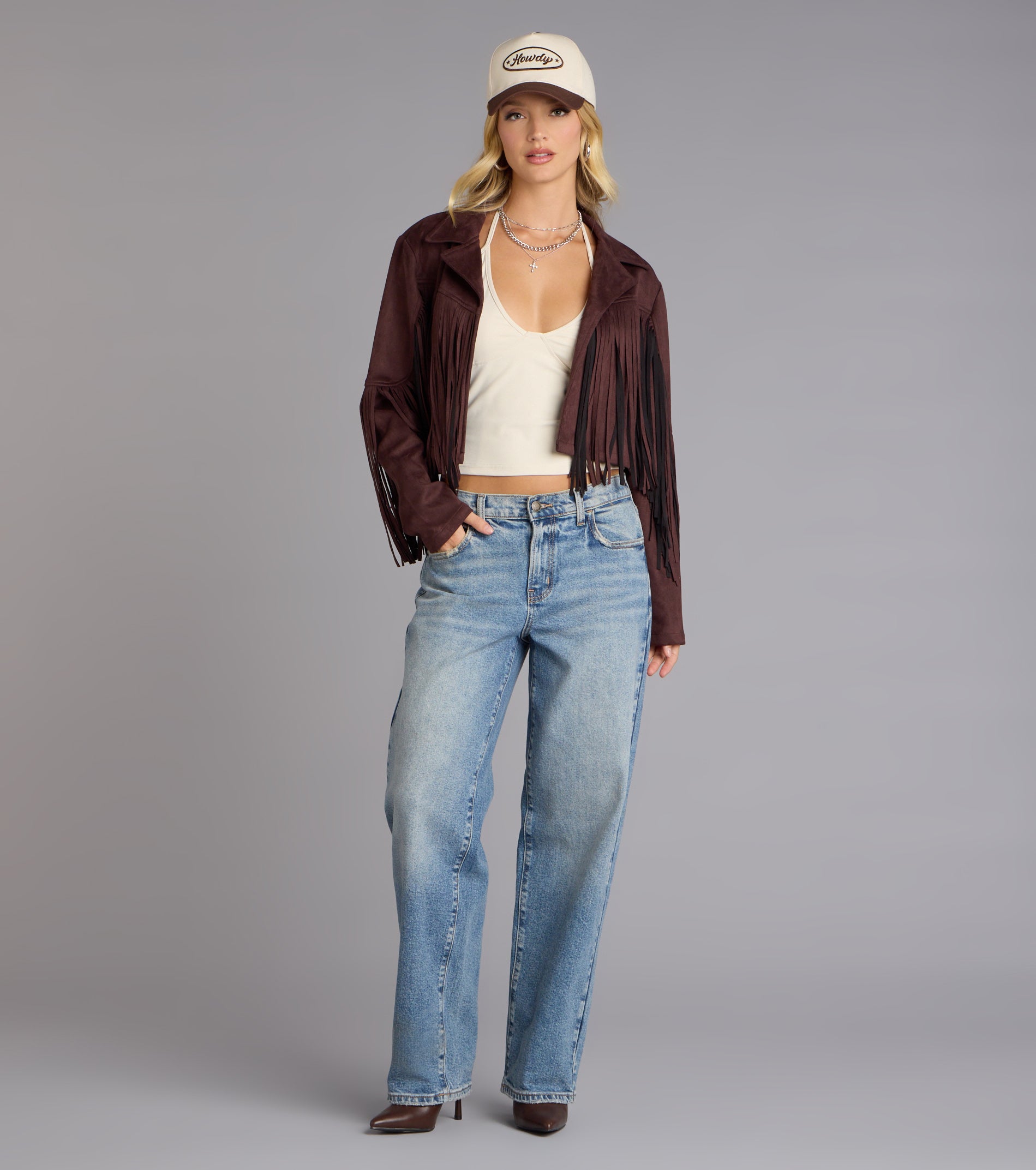 This piece brings trend-right energy to the Trailblazer Faux Suede Fringe Jacket, perfect for fall outfits that stand out.