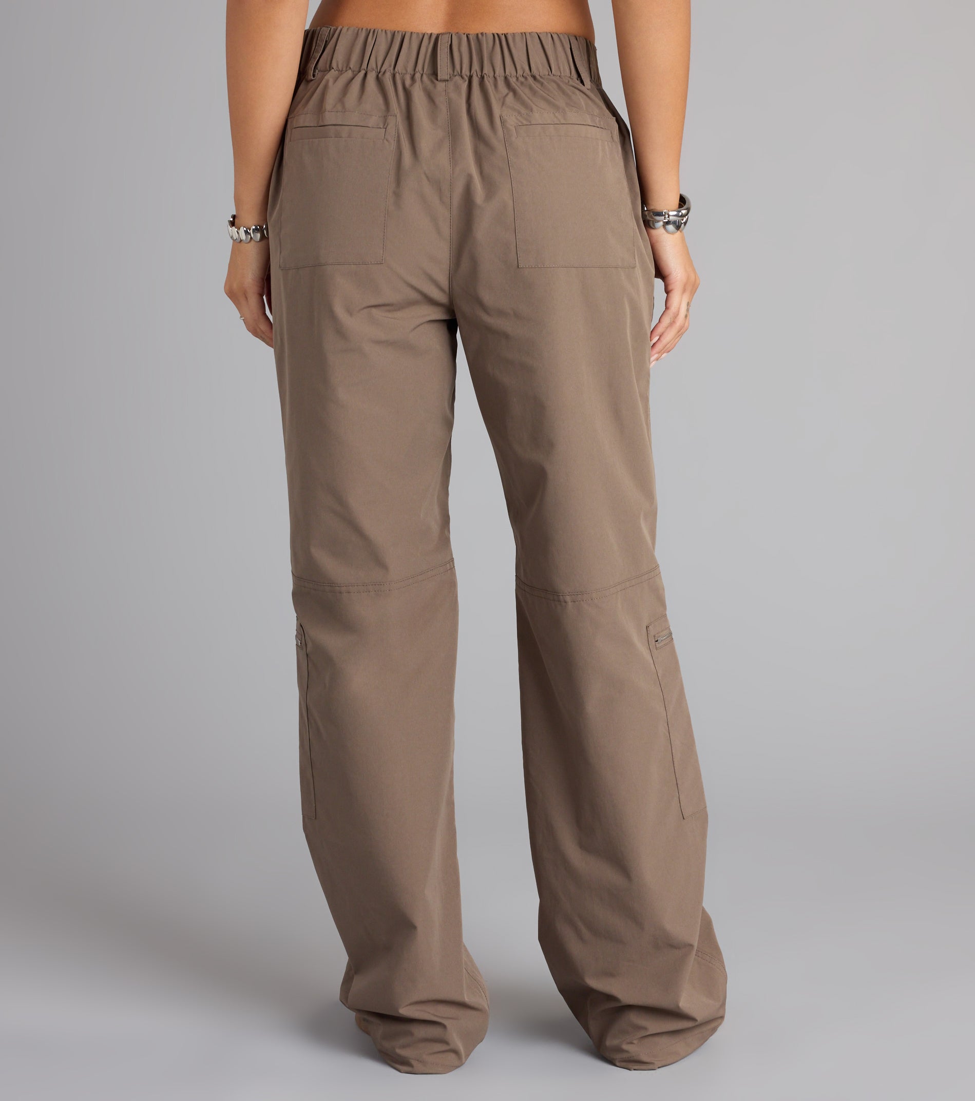 Make a fall statement in ccac4fe1-a26b-4162-b6e8 tones that highlight the Zip It and Chill Mid-Rise Cargo Pants as a must-have among fall bottoms for women.