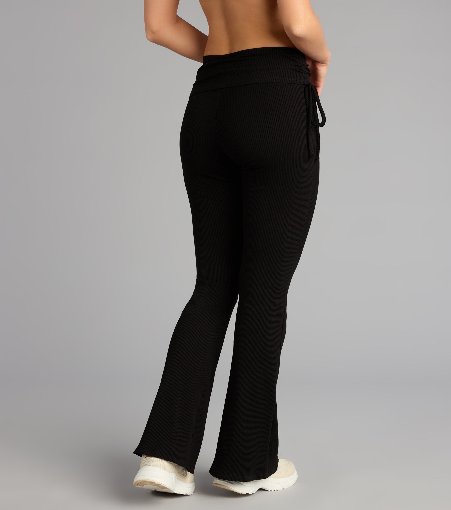 Make a fall statement in e2d25516-c238-4a17-9bbf tones that highlight the Lounge Goals Rib Knit Flare Pants as a must-have among fall bottoms for women.
