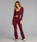 Make a fall statement in def7e0b0-4556-4e30-8dab tones that highlight the Chill Time Rib Knit Flare Pants as a must-have among fall bottoms for women.