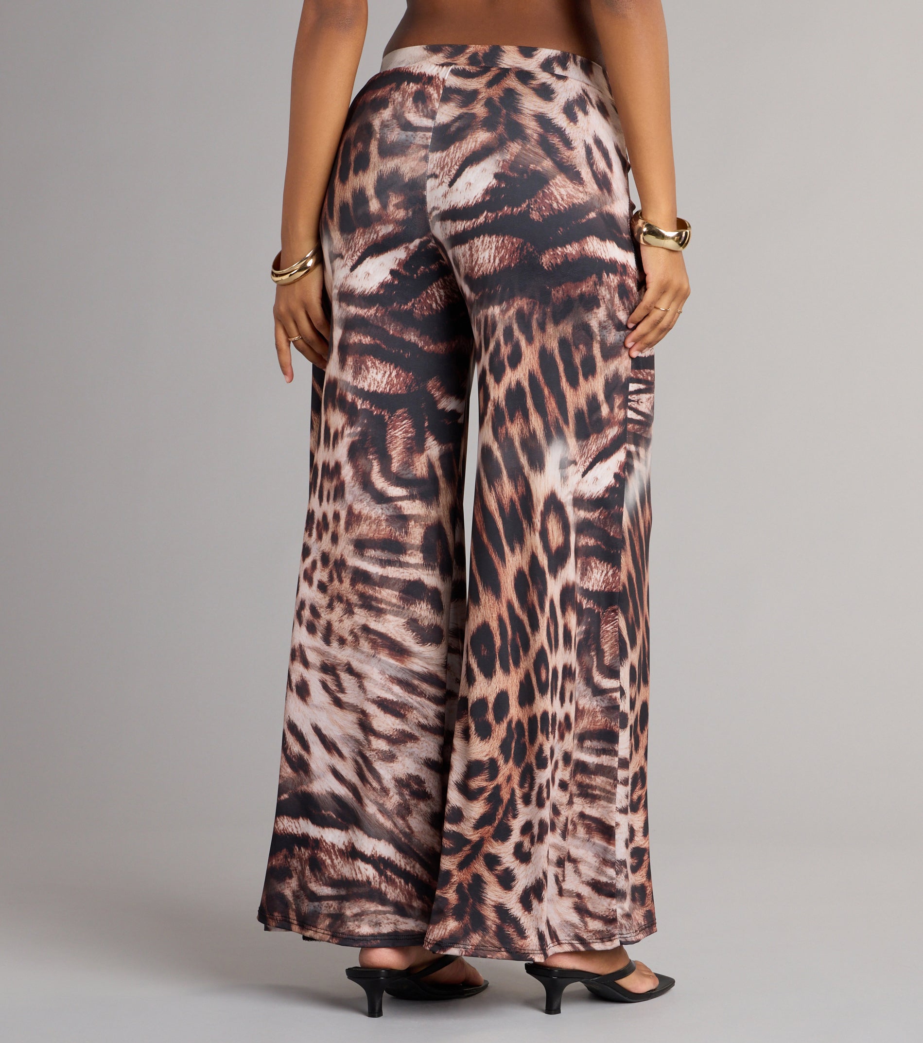 This piece brings trend-right energy to the Wild Side Leopard Wide-Leg Pants, perfect for fall outfits that stand out.