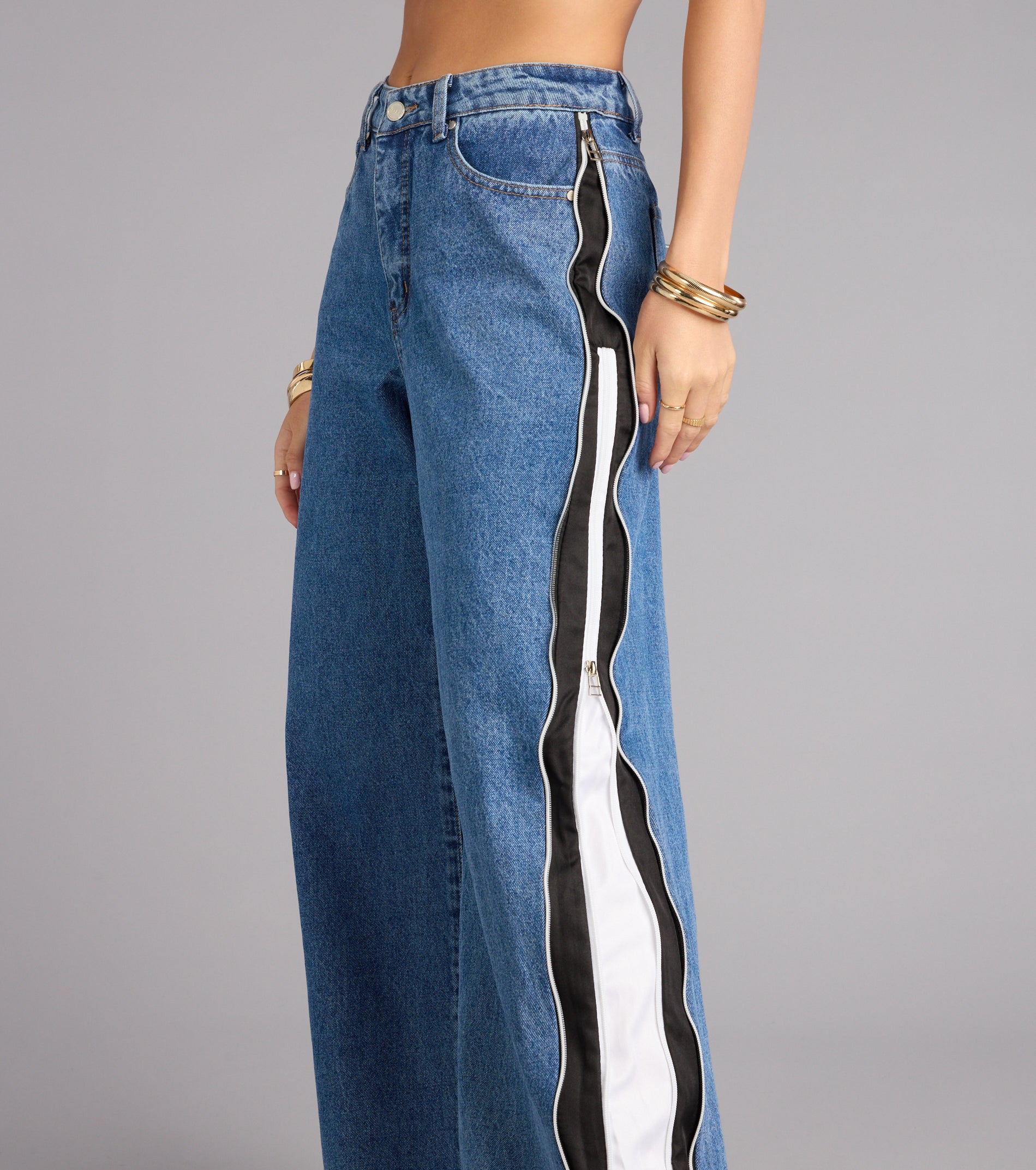 This medium denim wash piece brings trend-right energy to the Street Circuit High-Rise Wide Leg Denim Jeans, perfect for fall outfits that stand out.